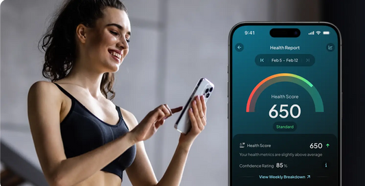woman looking at Hume Health App Health Score on phone