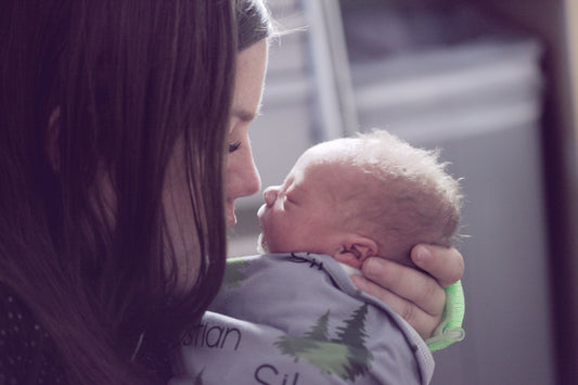 mom holding newborn