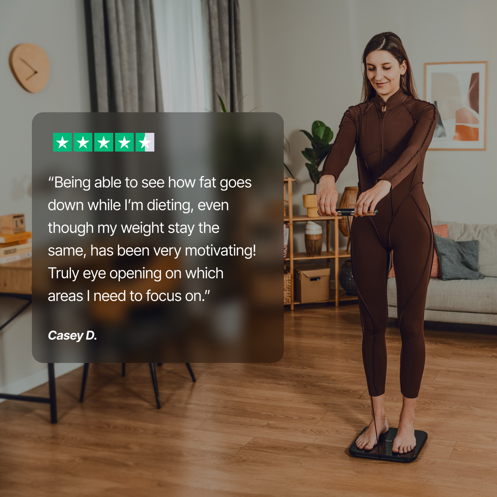 Woman in a brown jumpsuit standing in a living room with a quote overlay.